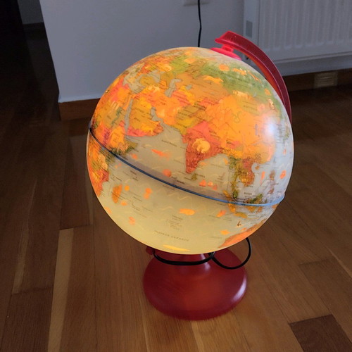 Globe table lamp used with lighting and switch