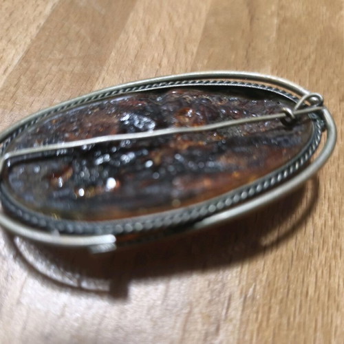 Amber brooch like new, weight 26 grams, length 6.5cm