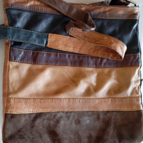 Crossbody bag made of suede used with signs of wear