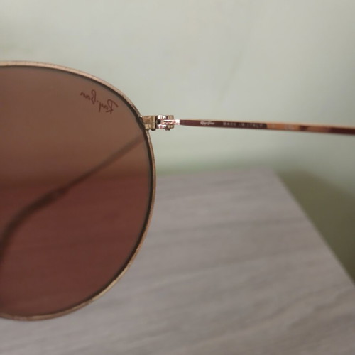 Ray-Ban sunglasses used, pink and gold with scratches