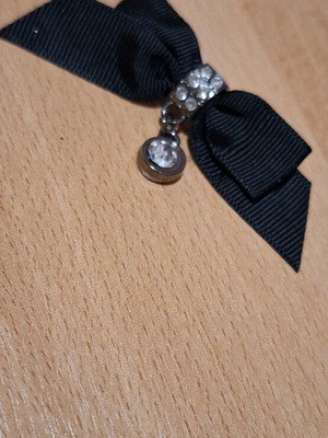 Pin black bow with zircon stones