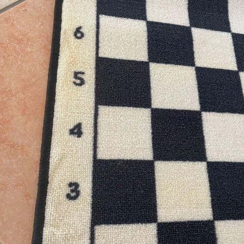 Chessboard rug square like new with plastic pieces 70x70