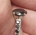πωλείται από συλλέκτη ορυκτών πολύτιμων λίθων μοναδικό ασημένιο 925 δαχτυλίδι με  μαύρο διαμάντι σε σχήμα round 3,5 ct και μαύρα διαμάντια στην γαμπα ,με το πιστοποιητικό γνησιότητας του. Η ευκαιρία!!