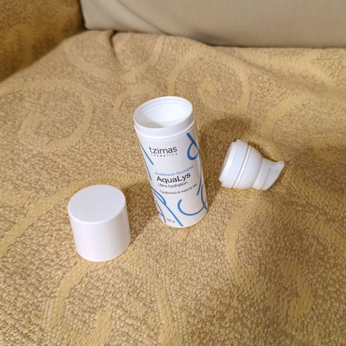 Empty face cream packaging 55g used