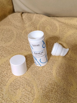 Empty face cream packaging 55g used