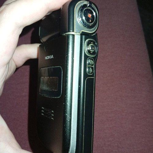 Nokia N93 used smartphone with charger, retro multimedia