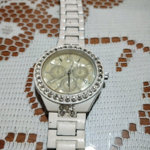 Avon watch used with white strap
