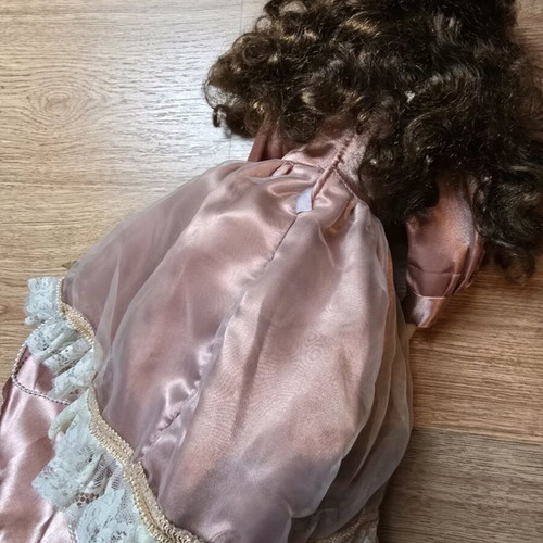 Glass doll like new with satin rotten apple dress and hat