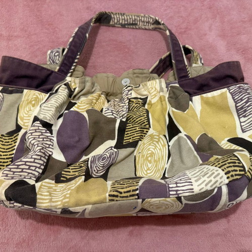Accessorize fabric shoulder bag like new with decorative stones