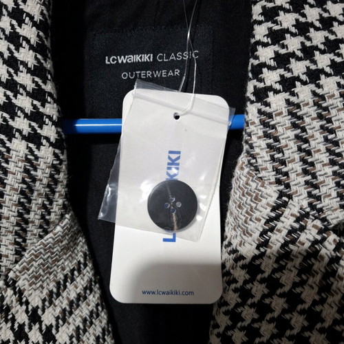 Women's black and white coat new, size XL