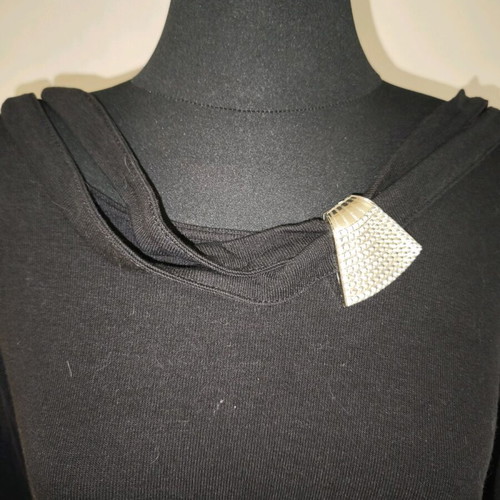 Women's black blouse used with metal decorative element on shoulder, size XL