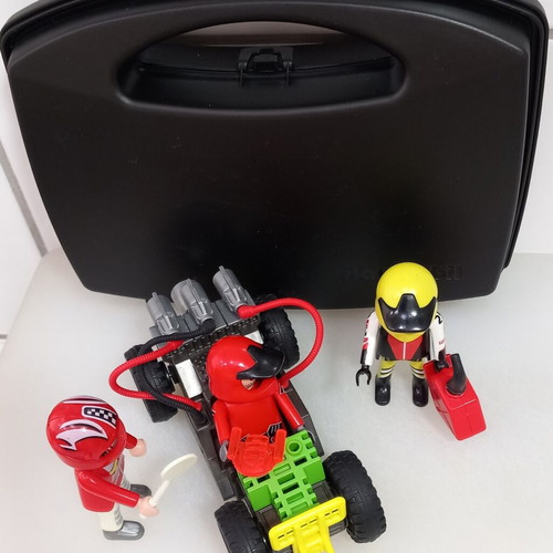 Playmobil car with pull back motion and 3 figures used