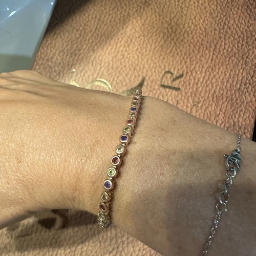 Tennis bracelet with multicolored round rhinestones and secure clasp