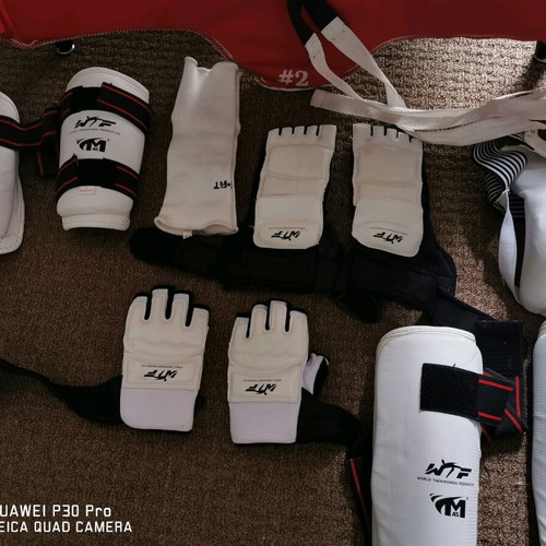 Tae Kwon do equipment used with medium chest protector and small accessories