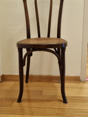 Wooden chair with cane like new
