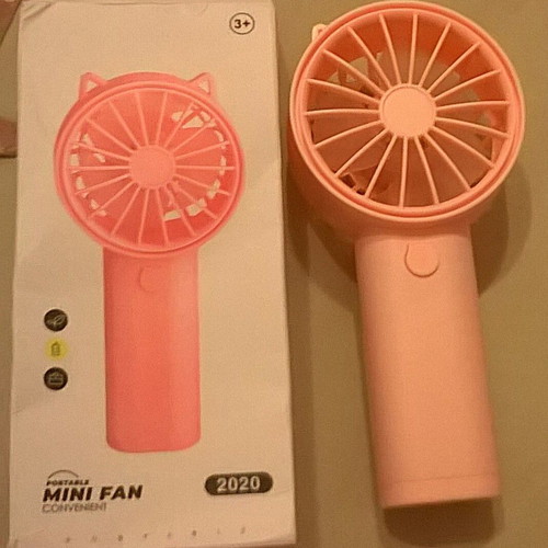 Pink Mini Fan like new with stable base, battery operated