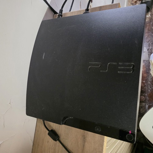 PlayStation 3 console with God of War and Call of Duty games used