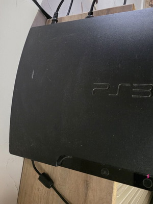 PlayStation 3 console with God of War and Call of Duty games used