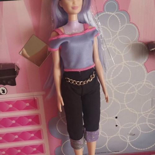 Barbie Colour Reveal doll with shiny purple hair