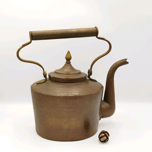 Vintage copper hand-forged teapot used with brass elements