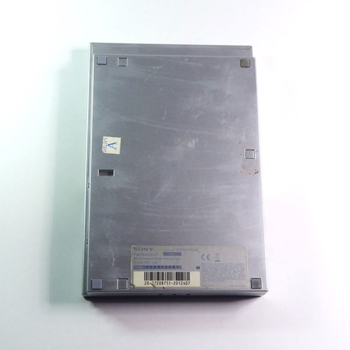 PlayStation 2 PS2 Slim silver console used for repair