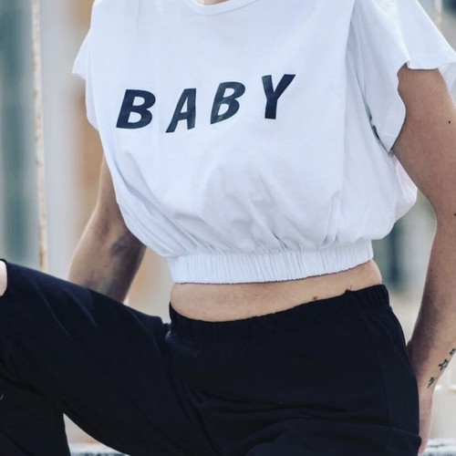 Crop top white with black print, shoulder pads and pleats, new