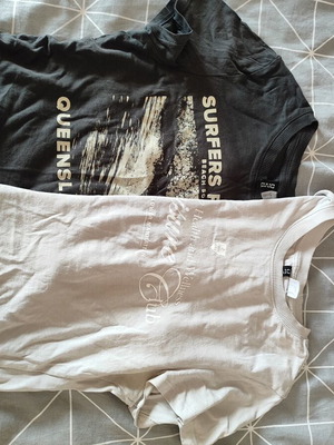 Used t-shirts set of 2, black and white, sizes S and M