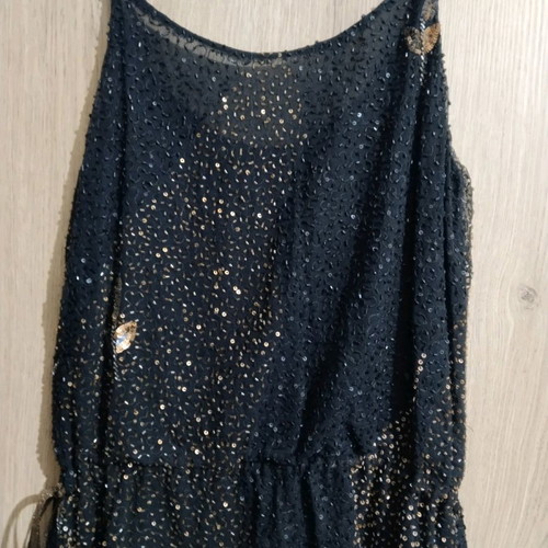 Embroidered top used, size small, black with beads and sequins
