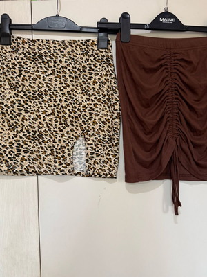 Set of 2 Mini Skirts like new, animal print and brown ribbed