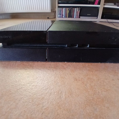 PlayStation 4 base console 500GB used with 4 games