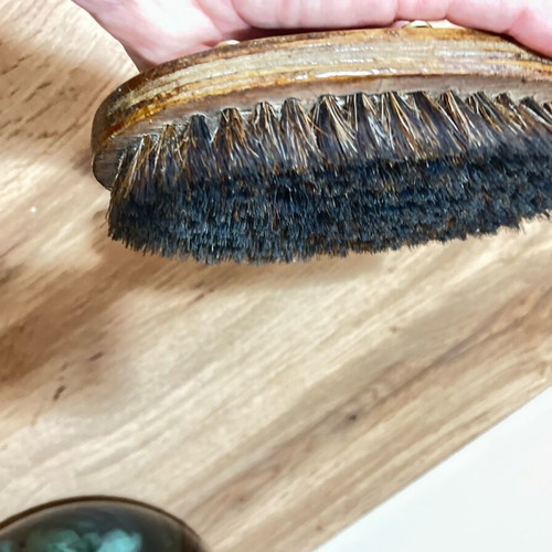 Vintage clothes brush with ornaments used, horsehair