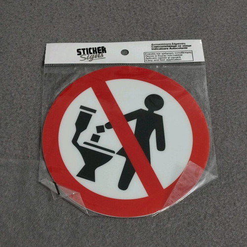 Sticker sign new against throwing paper in toilet