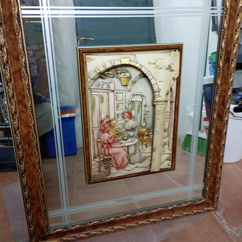 Mirror with plaster decorative scene like new, 50x70