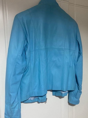 Leather jacket like new, blue with sleeve cut