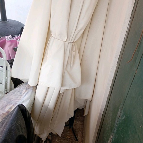 Garden umbrellas used with damage
