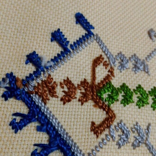 Handmade doilies like new with multicolor embroidery on ecru