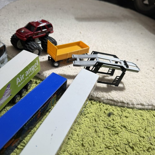 Large collection of toy trucks with accessories
