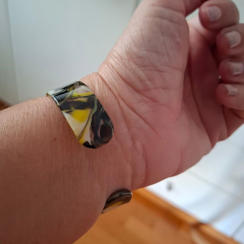 Plastic bracelet like bone colored like new