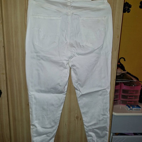 American Eagle white jeans like new, size L with asymmetric hem