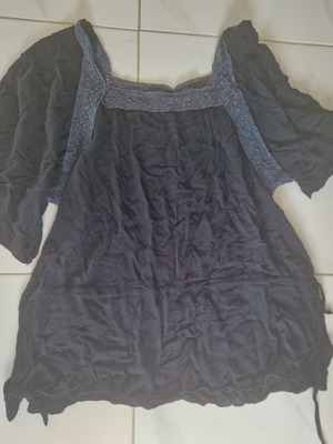 Women's black blouse with detailed upper part and waist cord, size L