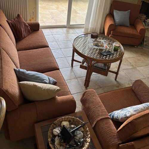 Three-piece living room set with sofa and two armchairs