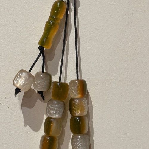 Two-tone worry beads in white and honey shades like new