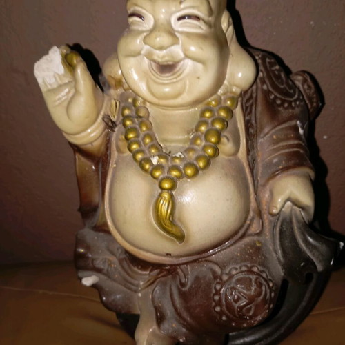 Budai statue used, symbol of happiness and prosperity