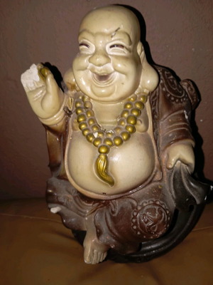 Budai statue used, symbol of happiness and prosperity