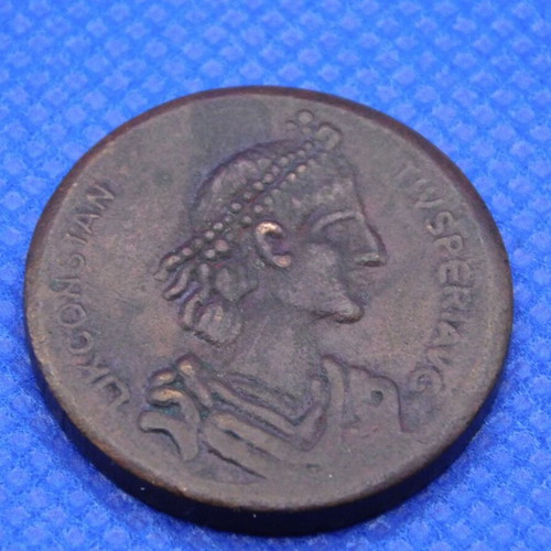Decorative bronze medal with relief design