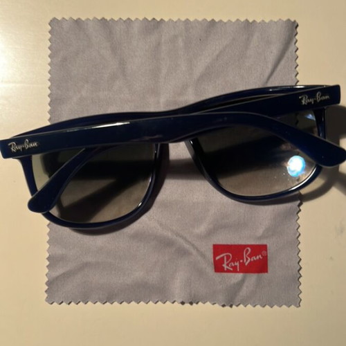 Ray-Ban 4147 sunglasses, blue semi-transparent frame, tinted lenses