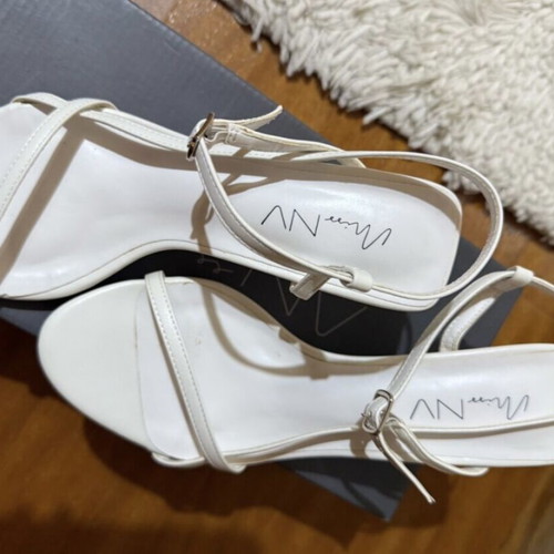 Envie white sandals with unique heel