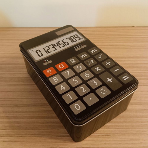 Metal storage box with calculator design, like new