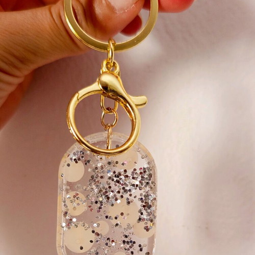Handmade keychain new resin with pearls and silver detail
