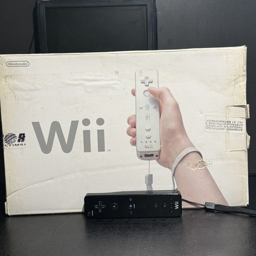 Nintendo Wii console used, boxed with black controller